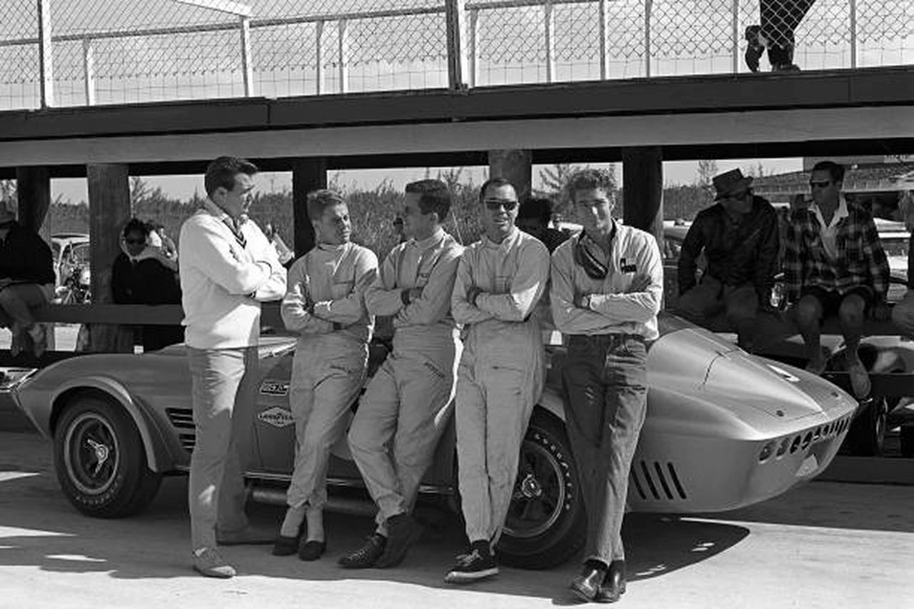 Captured during Speed Week at Nassau, this image brings together the small circle of drivers trusted to extract the Grand Sport’s potential when it mattered most. Dick Thompson (second from right), already known as the “Flying Dentist,” demonstrated the car’s balance and durability, helping validate its GT roots against international competition. Jim Hall (far right) applied his methodical, engineering-driven approach to show just how sophisticated the Grand Sport’s chassis and suspension really were under race conditions. Roger Penske (middle), still early in his career, delivered disciplined, professional performances that underscored the car’s outright speed and composure. Alongside them, Hap Sharp helped round out a driver lineup whose collective success at Nassau proved that—even with only five cars built—the Grand Sport could win convincingly when placed in capable hands.