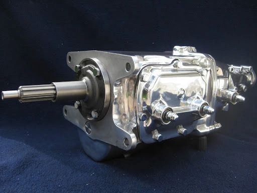 Chevrolet’s M22 “Rock Crusher” was the toughest Muncie close-ratio four-speed, using a heavy-duty, low-helix gearset that created the trademark gear whine. In 1970 Corvette service it was ultra-rare—about 25 units—essentially tied to the competition-minded ZR1 package. With a 2.20:1 first gear and beefed internals, it was built to shrug off high-rpm launches and road-race abuse.