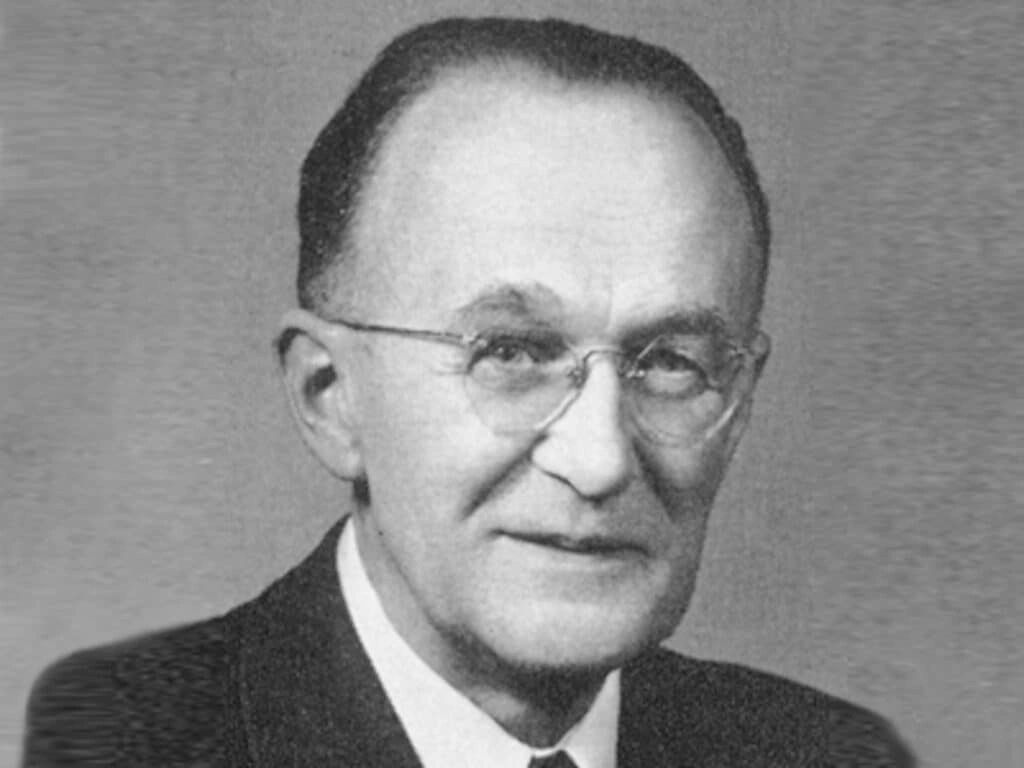 Maurice Olley was the quiet architect of the Corvette’s early dynamics—an English-born engineer from Rolls-Royce and Vauxhall who brought rigorous, no-nonsense science to Chevrolet in the 1920s. As Chevy’s R&D lead when the Corvette took shape, he championed fundamentals over flash, dictating the X-braced frame, independent front suspension, and stout live-axle rear that balanced cost, durability, and predictable handling. While Harley Earl’s team dazzled with Motorama glamour and fiberglass, Olley’s pencil-line geometry ensured the car felt composed and credible on the road. His discipline gave Corvette the engineering backbone it needed to grow into a true performance icon.