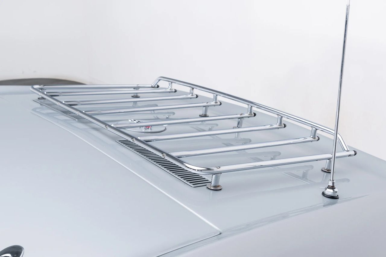 New for 1969, the optional chrome luggage rack sparked debate among Corvette purists, but proved a practical addition for road-trip-minded owners. While some lamented its impact on the clean rear profile, others embraced the utility—finally able to strap down weekend bags or T-tops without cramming the limited cargo space. Elegantly integrated and anchored with stainless hardware, the rack maintained Corvette’s sporty aesthetic while quietly expanding its long-haul capability. Love it or loathe it, the luggage rack captured the duality of the C3: part show car, part grand tourer. (Image courtesy of RK Motors)