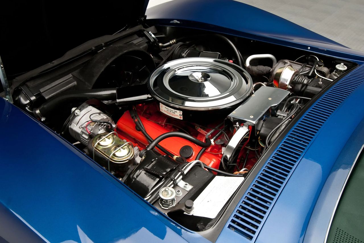 The 1972 Corvette’s ZQ3 was the standard 350-ci small-block, rated at 200 SAE net horsepower and 300 lb-ft of torque. With its 8.5:1 compression ratio, Quadrajet four-barrel carburetor, and hydraulic lifters, it was engineered for broad, easy torque rather than high-rpm drama. The big drop in published output compared to 1971 was mostly the result of the industry-wide switch from gross to net horsepower ratings—making the numbers look softer even though real-world performance barely changed. Out on the road, a healthy ZQ3 still delivered that smooth, confident, small-block shove that defined the early C3 driving experience. (Image courtesy of RK Motors)
