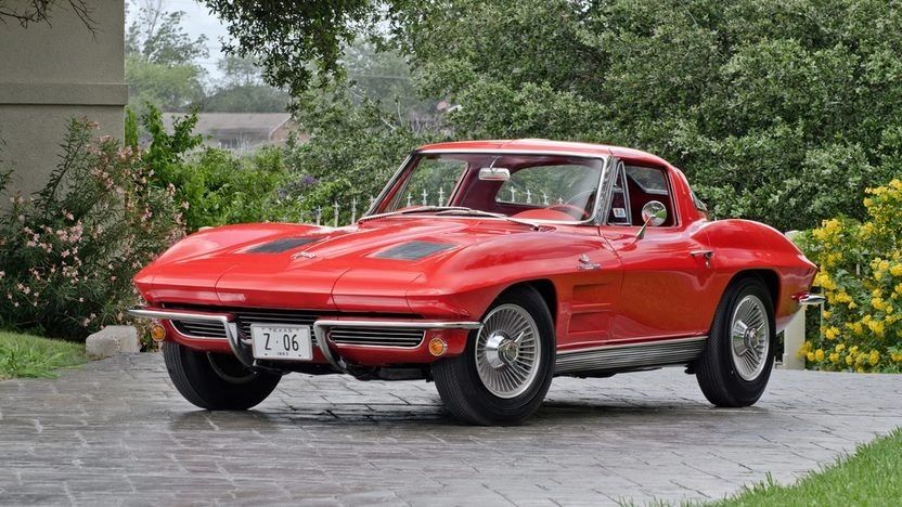 Pictured here is a stunning 1963 Corvette Sting Ray Z06, finished in Riverside Red and fitted with knock-off style wheels. The Z06 package, masterminded by Zora Arkus-Duntov, transformed the already groundbreaking Sting Ray into a track-ready weapon with heavy-duty suspension, upgraded brakes, and the potent 327ci fuel-injected V8. With only 199 built in 1963, and just 63 featuring the optional 36.5-gallon “big tank,” the Z06 remains one of the rarest and most desirable Corvettes ever produced. Pictured here is a stunning 1963 Corvette Sting Ray Z06, finished in Riverside Red and fitted with knock-off style wheels. The Z06 package, masterminded by Zora Arkus-Duntov, transformed the already groundbreaking Sting Ray into a track-ready weapon with heavy-duty suspension, upgraded brakes, and the potent 327ci fuel-injected V8. With only 199 built in 1963, and just 63 featuring the optional 36.5-gallon “big tank,” the Z06 remains one of the rarest and most desirable Corvettes ever produced.