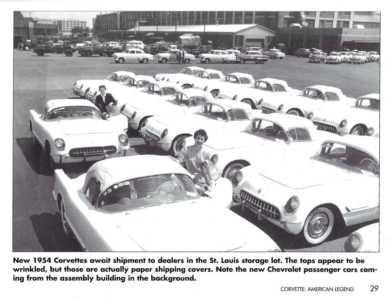 This photo shows rows of brand-new 1954 Corvettes staged in the St. Louis storage lot, awaiting shipment to dealers across the country. At first glance, the cars appear to be wearing white protective tops, but those are actually paper shipping covers designed to shield the interiors during transport. The image underscores the scale of Corvette’s second year—production had jumped from just 300 hand-built cars in Flint to over 3,600 units in St. Louis. In the background, you can see Chevrolet passenger cars streaming out of the adjacent assembly building, a reminder that Corvette was still very much the outlier: a fiberglass-bodied sports car being built alongside sedans and wagons destined for everyday America.