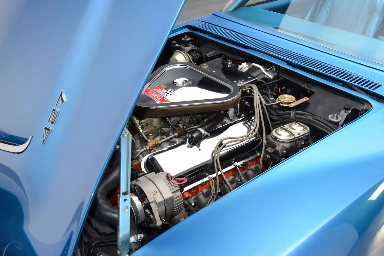 image generator said:  This is the L68 427/400, Chevrolet’s entry-level Tri-Power big-block for 1969. With three two-barrel Holleys and a hydraulic cam, it delivered a satisfying step up in both sound and response—adding induction drama without the raw edge of solid lifters. (Image courtesy of RK Motors)