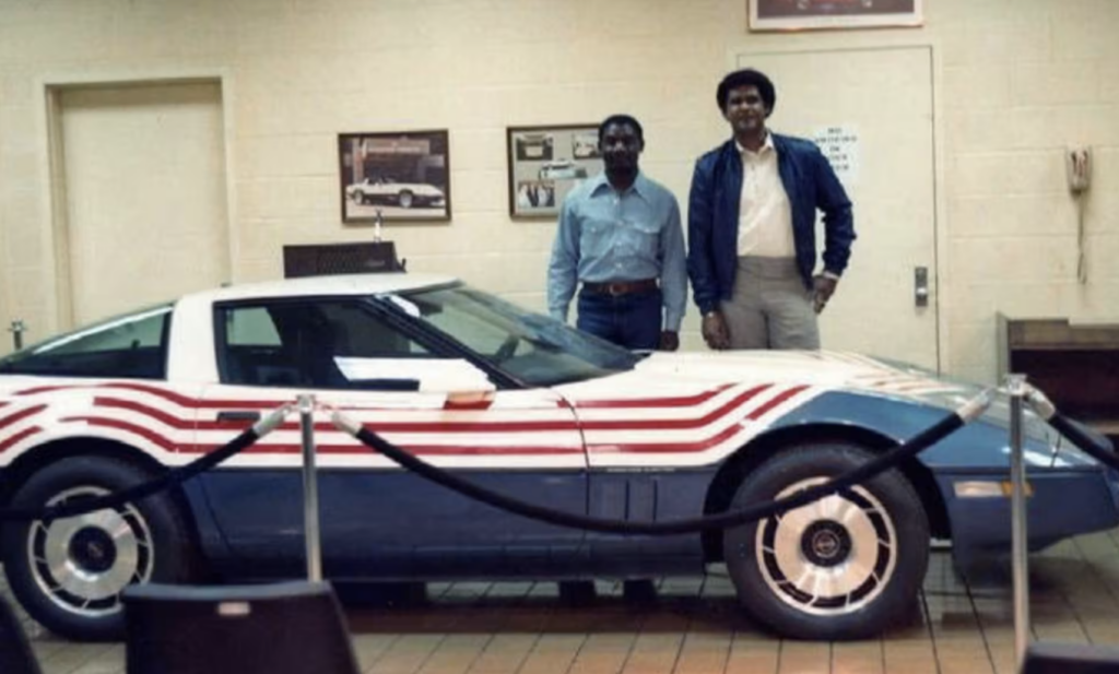 This image captures the lone surviving 1983 Corvette at the Bowling Green Assembly Plant, shown here in a distinctive red, white, and blue commemorative paint scheme. The patriotic livery was applied for display purposes, transforming the pre-production C4 into a visual tribute to Corvette’s heritage and its American identity. Standing beside the car is Wendyll Strode, who would later become the founding Executive Director of the National Corvette Museum. When the Museum opened in 1994, the one-and-only 1983 Corvette was formally placed on display there—permanently preserving the “missing” model year as a centerpiece of Corvette history.