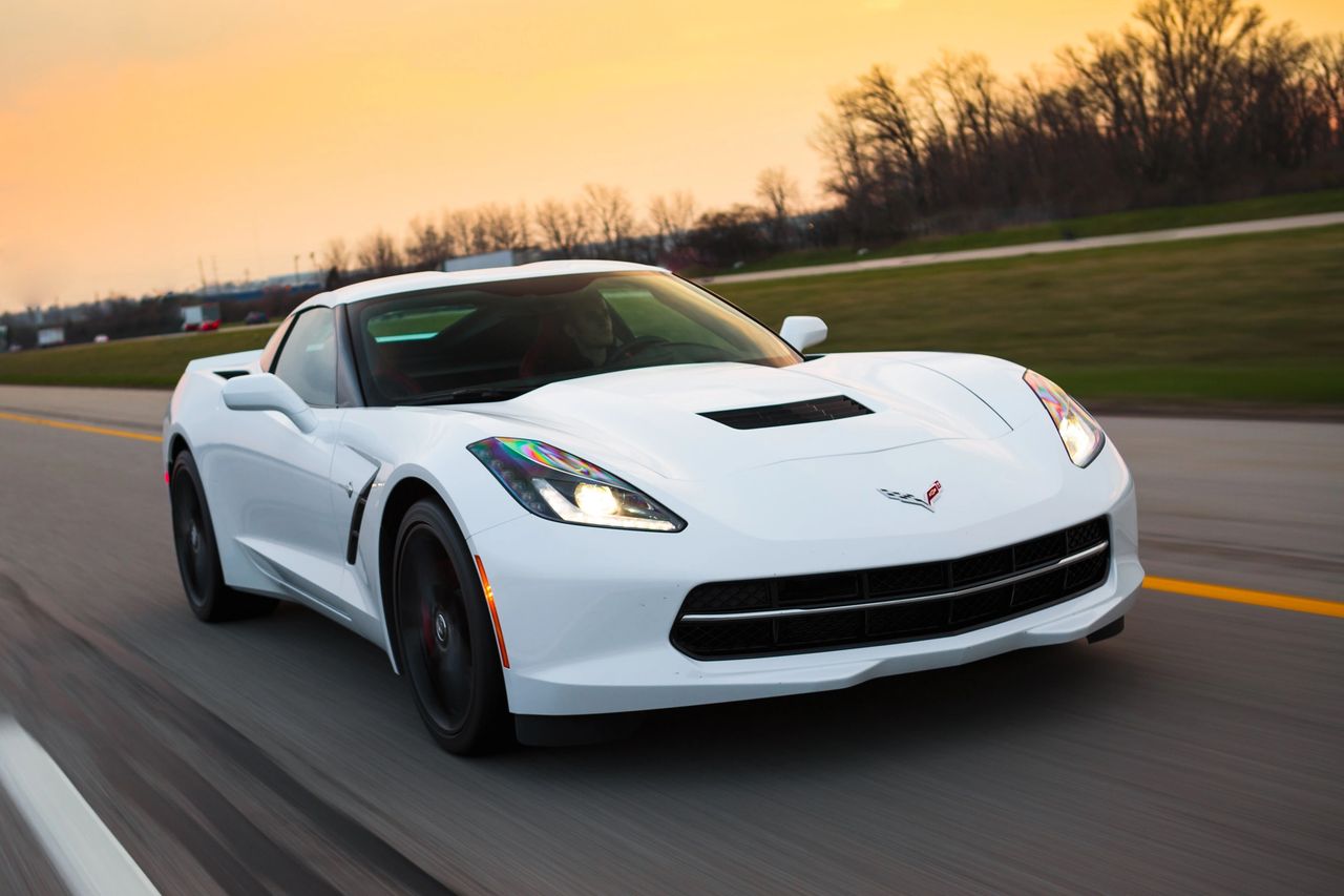 Automobile Magazine named Tadge Juechter its 2014 “Man of the Year,” crediting him as the guiding force behind the seventh-generation Corvette Stingray. Only the fifth chief engineer in Corvette’s long history, Juechter was praised for “getting it right” by reimagining the car from top to bottom, not just fixing past complaints. The story highlights thoughtful engineering touches—like the seven-speed manual with rev-matching—and Juechter’s push for a serious interior that could stand up to 1-g days on track. It also frames the C7 as a product of focused leadership in a post-bankruptcy GM, with Juechter navigating corporate realities to secure the support Corvette needed. (Image courtesy of Patrick M. Hoey Photography)