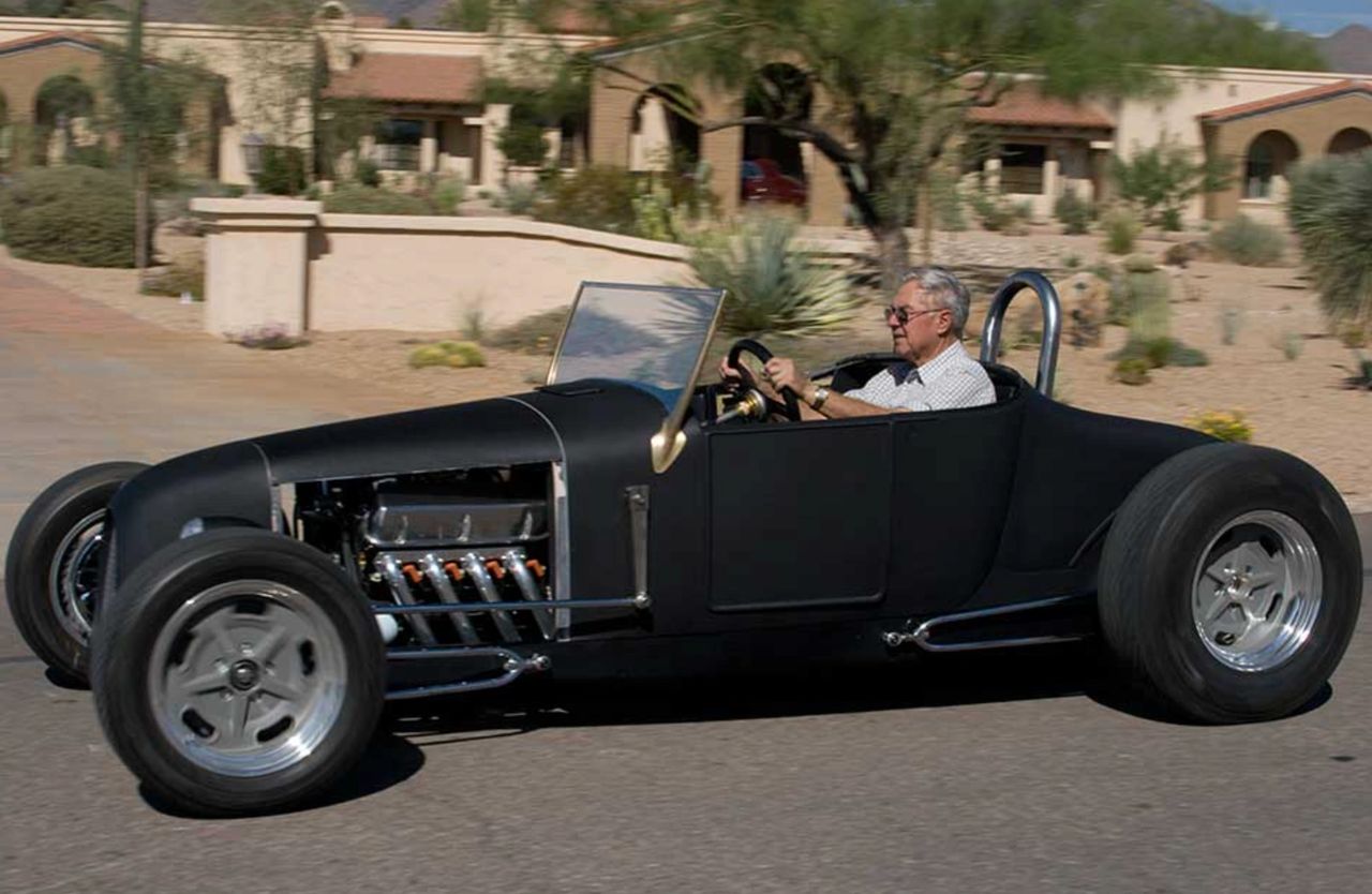 Neil DeAtley (driving) and his 1927 Ford Track-T Roadster (Image courtesy of Dean's Garage)