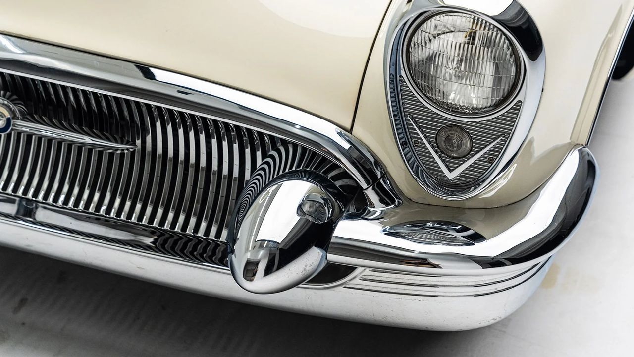 The massive bumper pod (seen here) is one of two "buffer bombs" added to the front grill to add an element of theatricality to the design. (Image courtesy of the Petersen Museum.)