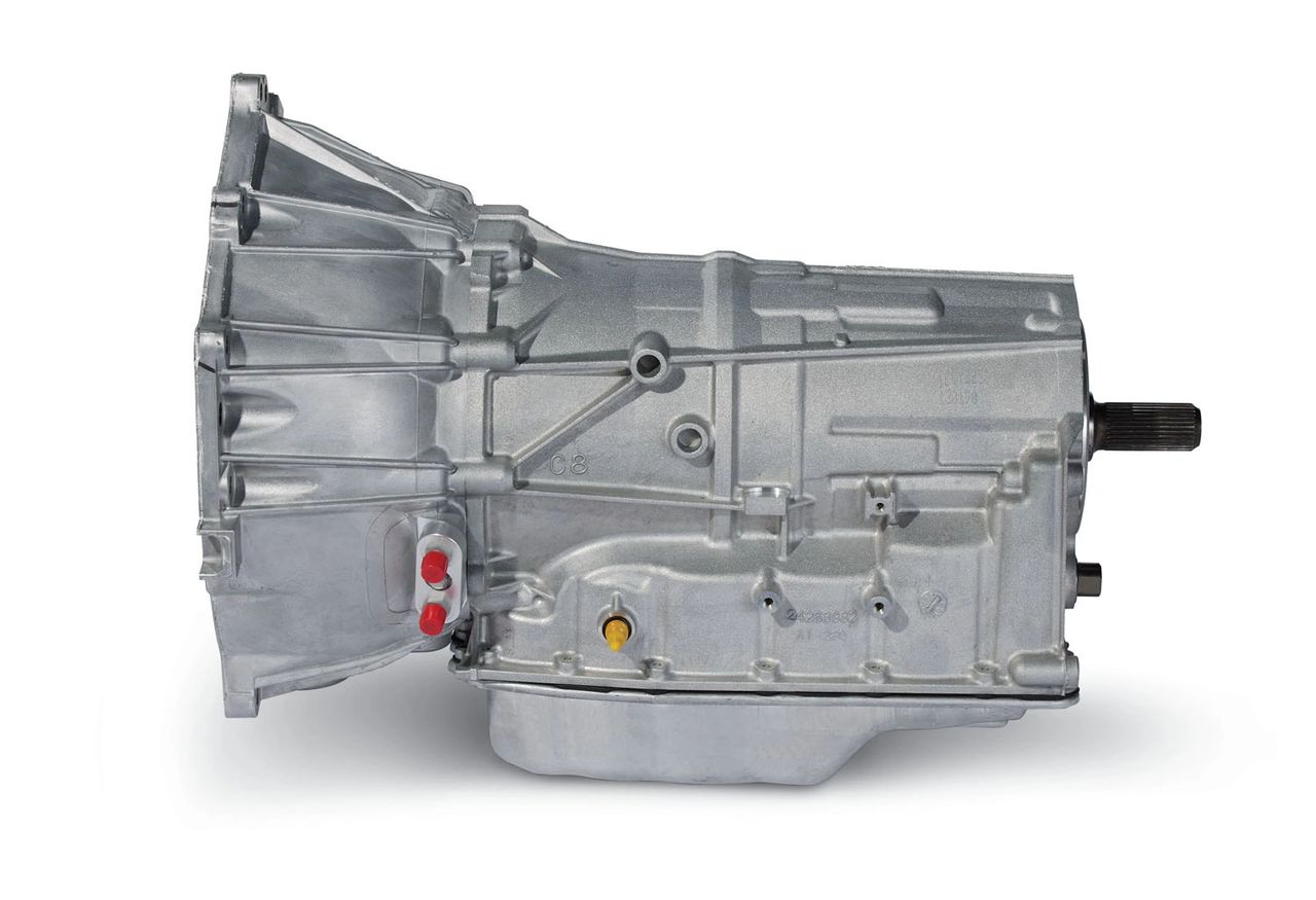 Hydra-Matic 6L80: the six-speed automatic offered in the 2014 Stingray before the 8-speed arrived. A clutch-to-clutch unit with a lockup converter and TAPShift paddles, it was calibrated to play nicely with AFM and the LT1’s fat midrange—holding gears in Sport/Track, rev-matching on downshifts, and settling into low-rpm cruise on the highway. Proven, durable, and smarter than past Corvette autos. (Image courtesy of GM Authority)