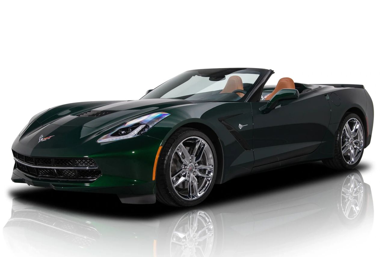 Deep Emerald over Kalahari, top down, and every line of the C7 Stingray Convertible looks like it was drawn with a scalpel. Chrome split-five wheels, vented hood, and the clean tonneau give it that “grand tourer at rest, predator in motion” stance. It’s the open-air Stingray that marries couture color with track-honest hardware. (Image courtesy of RK Motors)