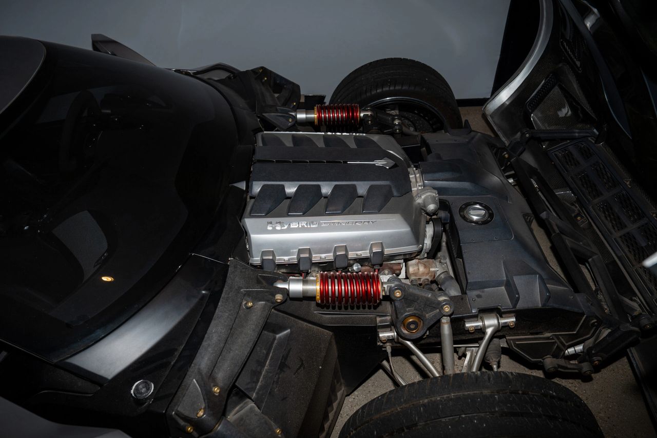 A stock LS3 engine powers the StingRay Concept.  Note the "Hybrid" labeling on the manifold covers. The StingRay Concept is NOT a hybrid vehicle.). (Image courtesy of the National Corvette Museum.)