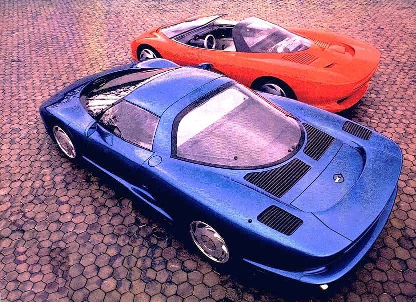 The 1986 Corvette Indy (red) and the 1990 CERV III shared very little actual "DNA", but the evolution from one to the other was undeniable. In a very real way, the CERV III breathed life into the technologies that the Corvette Indy hypothesized about.  (Image courtesy of GM Media LLC.)