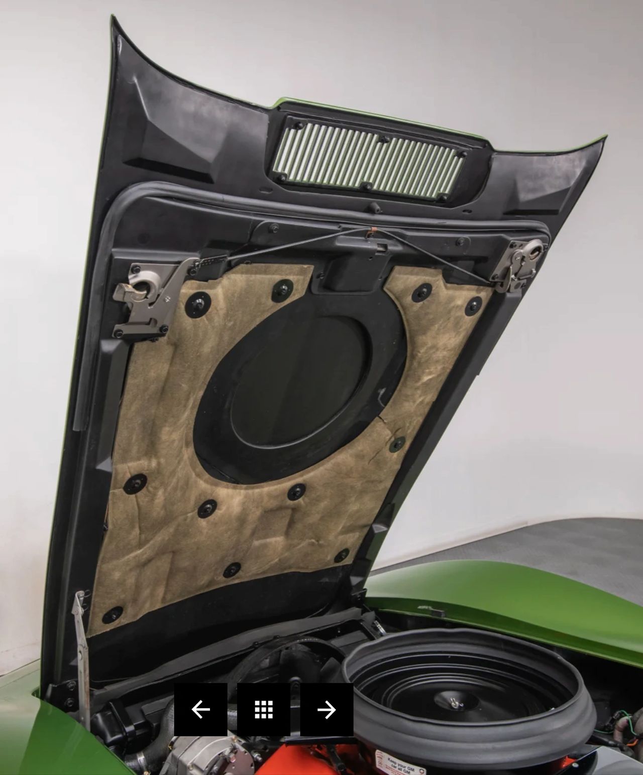 ChatGPT said:  One of the subtler but most meaningful upgrades for 1973 was Chevrolet’s push to tame noise, vibration, and harshness in the Corvette. Under the hood, new insulation pads like the one shown here helped soak up valvetrain clatter and induction roar before it reached the cabin, taking the edge off the big V8 without muting it. Chevrolet paired that with revised rubber engine and body mounts that isolated more vibration from the frame while still keeping the car feeling tight and responsive. The result was a Stingray that sounded less raw and tinny, but still very much like a Corvette when you laid into the throttle. It was the first real step toward a car you could drive all day without feeling like you’d spent it inside the engine bay. (Source: RK Motors)