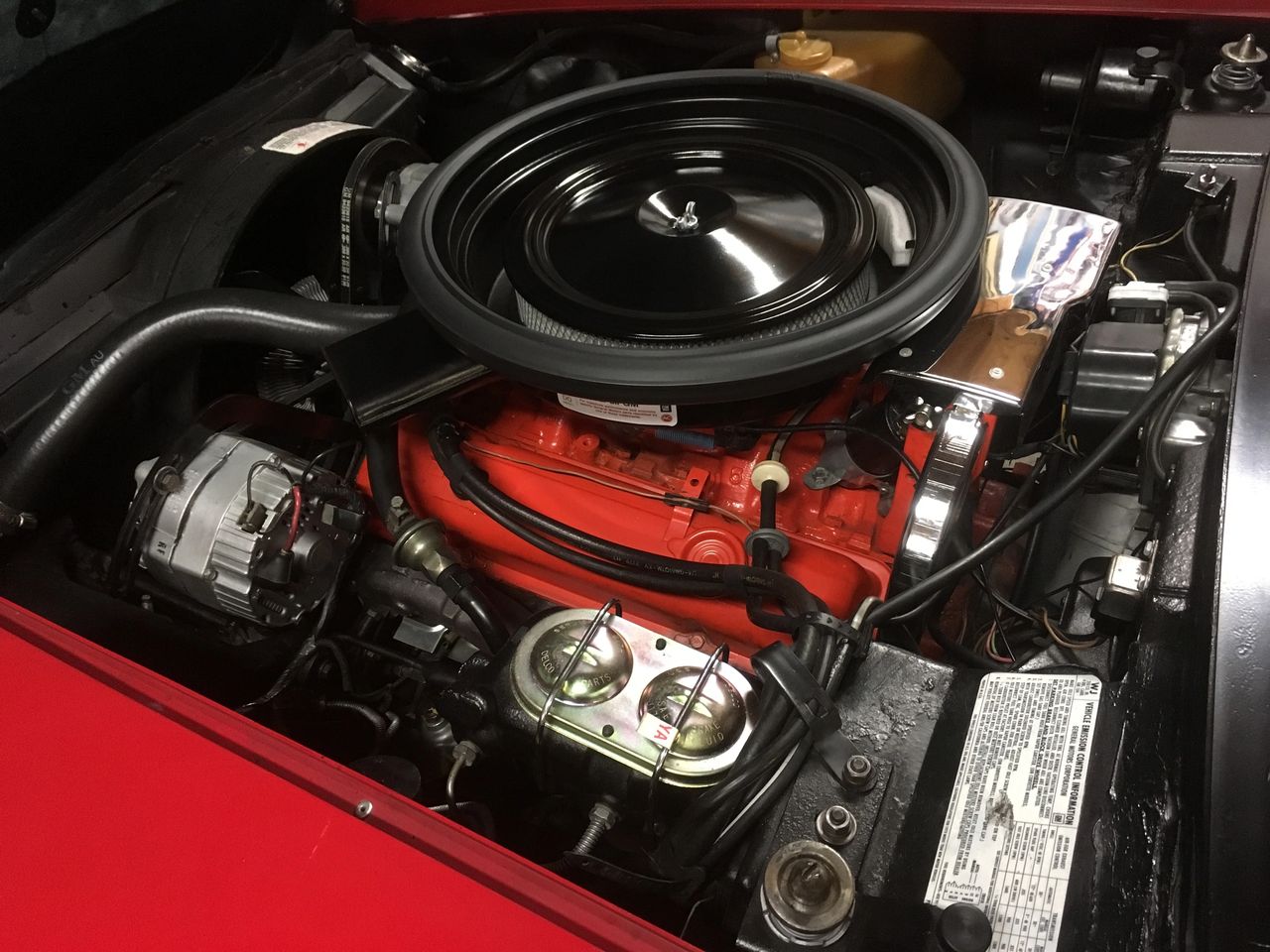 Under the hood of many 1973 Corvettes lived this workhorse: the L48 350-cubic-inch small-block. Rated at 190 horsepower, it was no longer the fire-breather of the late ’60s, but it delivered smooth, usable torque and easy drivability that matched the car’s move toward a more refined grand-touring role. Paired with either a four-speed manual or Turbo-Hydramatic automatic, the L48 made the ’73 Stingray perfectly happy in traffic, on the highway, or cruising a back road without constant gear-hunting. It also tolerated the new unleaded-fuel and emissions realities better than the wilder solid-lifter mills that came before it. In a year defined by compromise, this engine became the dependable, everyday heart that kept Corvette ownership within reach for a broad slice of buyers. (source: CorvetteForum)