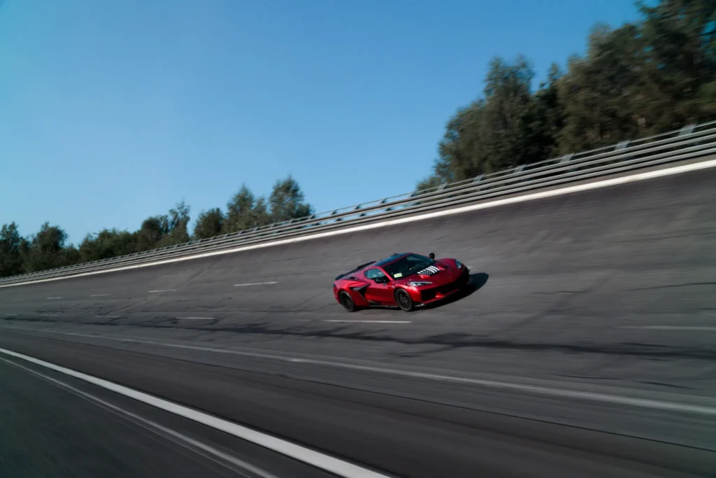 Mark Reuss driving the 2025 Corvette ZR1 to a 233-mph two-way average