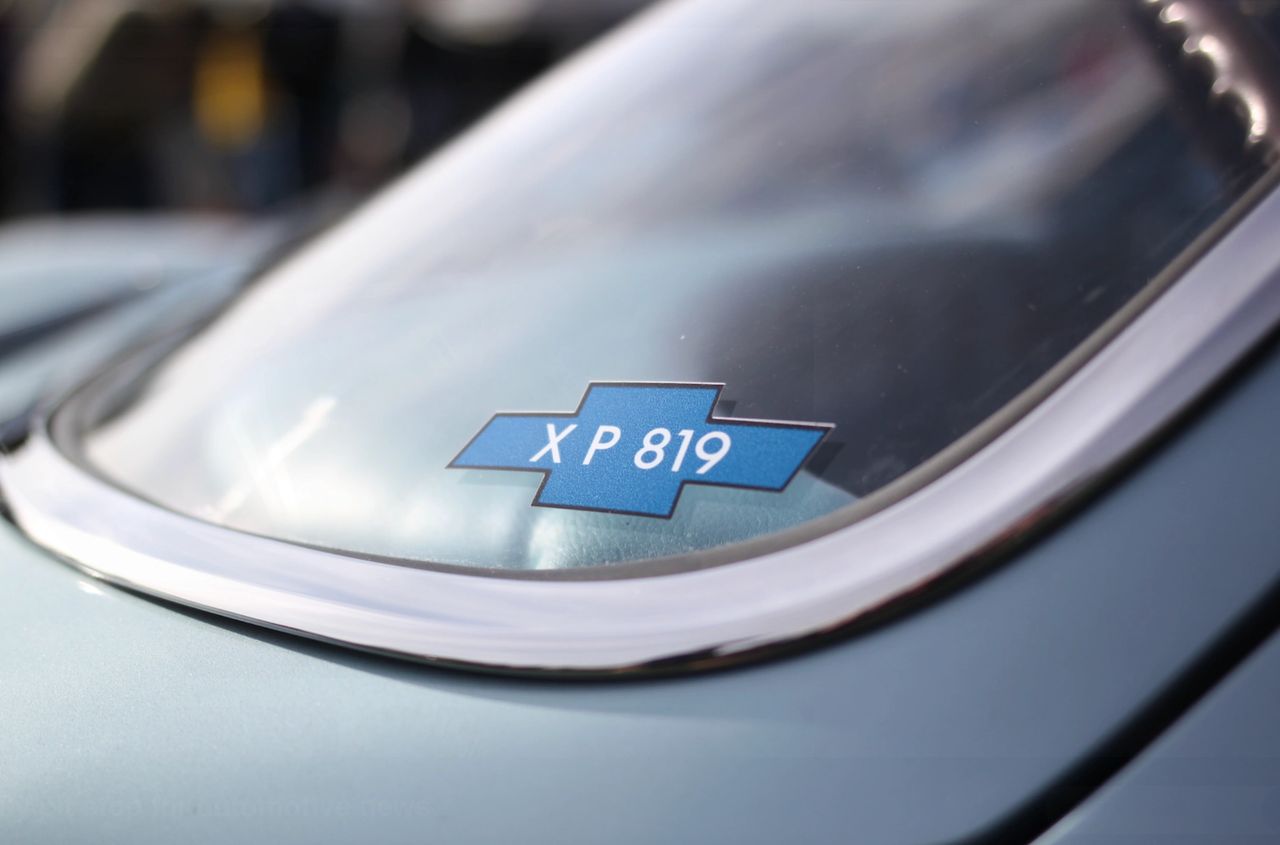 For Steve Tate, the moment he realized what he’d hauled home from Smokey Yunick’s parts sale was crystallized in three simple characters: XP 819. That little blue bowtie emblem confirmed he wasn’t just looking at a pile of odd Corvette parts, but the scattered remains of Chevrolet’s lost rear-engine experiment. Where others saw scrap, Tate saw a once-in-a-lifetime responsibility—to keep the car together, document what he had, and begin the long process of making it whole again. That badge became both a talisman and a promise, a quiet reminder that he was now the caretaker of a one-off chapter in Corvette history that GM itself had tried to erase. For Steve Tate, the moment he realized what he’d hauled home from Smokey Yunick’s parts sale was crystallized in three simple characters: XP 819. That little blue bowtie emblem confirmed he wasn’t just looking at a pile of odd Corvette parts, but the scattered remains of Chevrolet’s lost rear-engine experiment. Where others saw scrap, Tate saw a once-in-a-lifetime responsibility—to keep the car together, document what he had, and begin the long process of making it whole again. That badge became both a talisman and a promise, a quiet reminder that he was now the caretaker of a one-off chapter in Corvette history that GM itself had tried to erase.