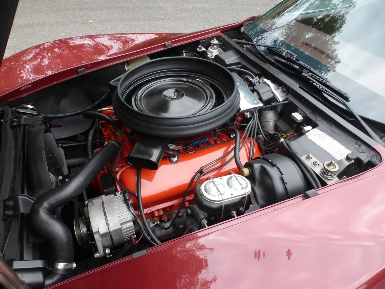 The 1974 Corvette’s LS4 marked the final appearance of Chevrolet’s legendary 454 cubic-inch big-block, closing an important chapter in Corvette performance history. Rated at 270 horsepower (net), the LS4 emphasized immense low-end torque and effortless acceleration rather than high-revving horsepower. While emissions and fuel economy pressures had softened its peak output compared to earlier big-blocks, the driving experience remained unmistakably muscular. As the last big-block Corvette engine ever offered, the LS4 carries enduring historical significance and strong collector appeal today.