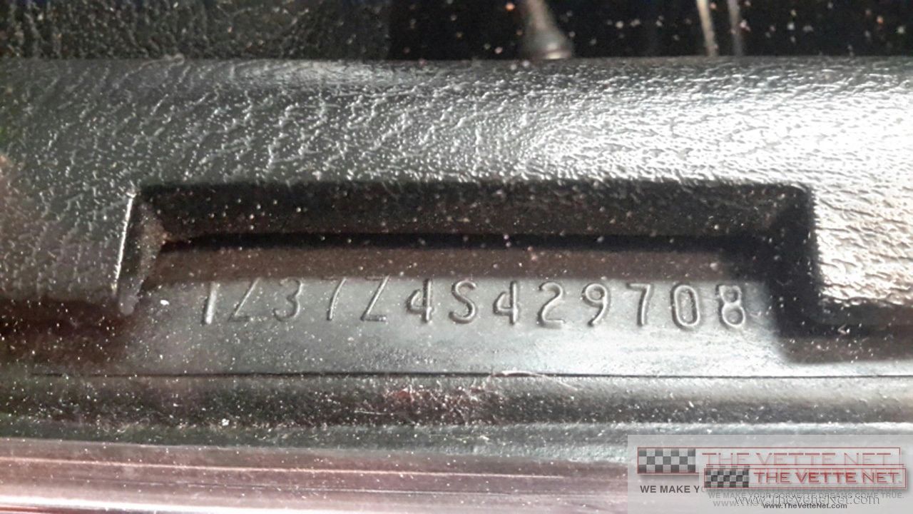 The VIN stamping shown here, 1Z37Z4S429708, decodes as a 1974 Corvette coupe equipped with the LS4 454-cid big-block V8, built at the St. Louis, Missouri assembly plant. The first two characters “1Z” identify a Chevrolet Corvette, “37” denotes the coupe body style, “Z” is the LS4 engine code, “4” tags the 1974 model year, and “S” indicates St. Louis, while the final six digits place this car in the later portion of the 1974 production run. (Image credit:thevettenet.com)