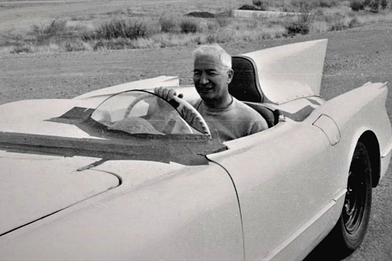 Bare fiberglass, a tiny windscreen, and a grinning engineer at the wheel—this is the no-nonsense testbed ethos that shaped Chevrolet’s experimental era. In 1955, Zora Arkus-Duntov stormed Pikes Peak in a thinly disguised ’56 Chevrolet and set a new production-class record, using the mountain as his laboratory for the fledgling small-block V-8. The brutality of that climb—heat, broken pavement, and tire slip at altitude—cemented his conviction to centralize mass and “listen to the tire,” a philosophy that would harden into the mid-engine CERV I. In many ways, this image is the prologue to Zora’s “design without limits.” (Image courtesy of GM Media LLC)