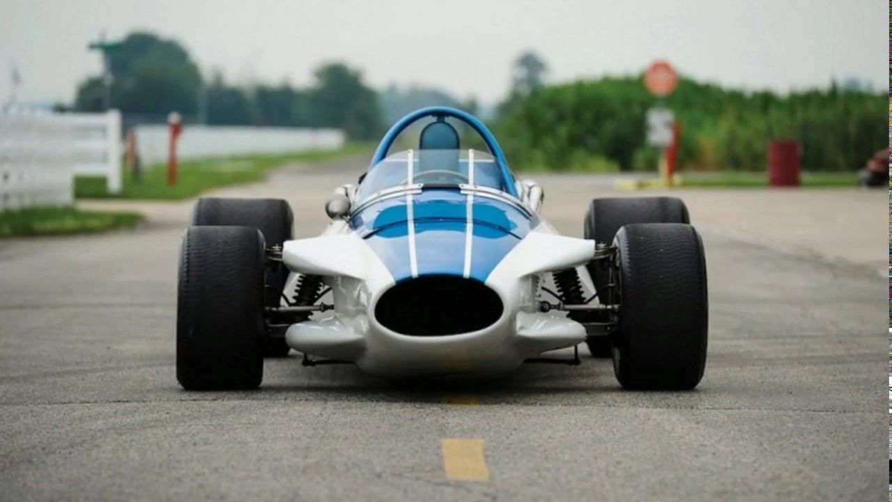 Seen head-on, CERV I reveals the elegance of its simplicity. A narrow fiberglass shell wraps a chrome-moly spaceframe, with nothing extra to clutter its purpose—just suspension arms, open dampers, and a single oval intake feeding the mid-mounted small-block. There are no frills, no styling flourishes, only what Zora Duntov’s team needed to collect data at speed. The result is a car that looks as experimental as it was: a pure test instrument, reduced to its essential architecture.