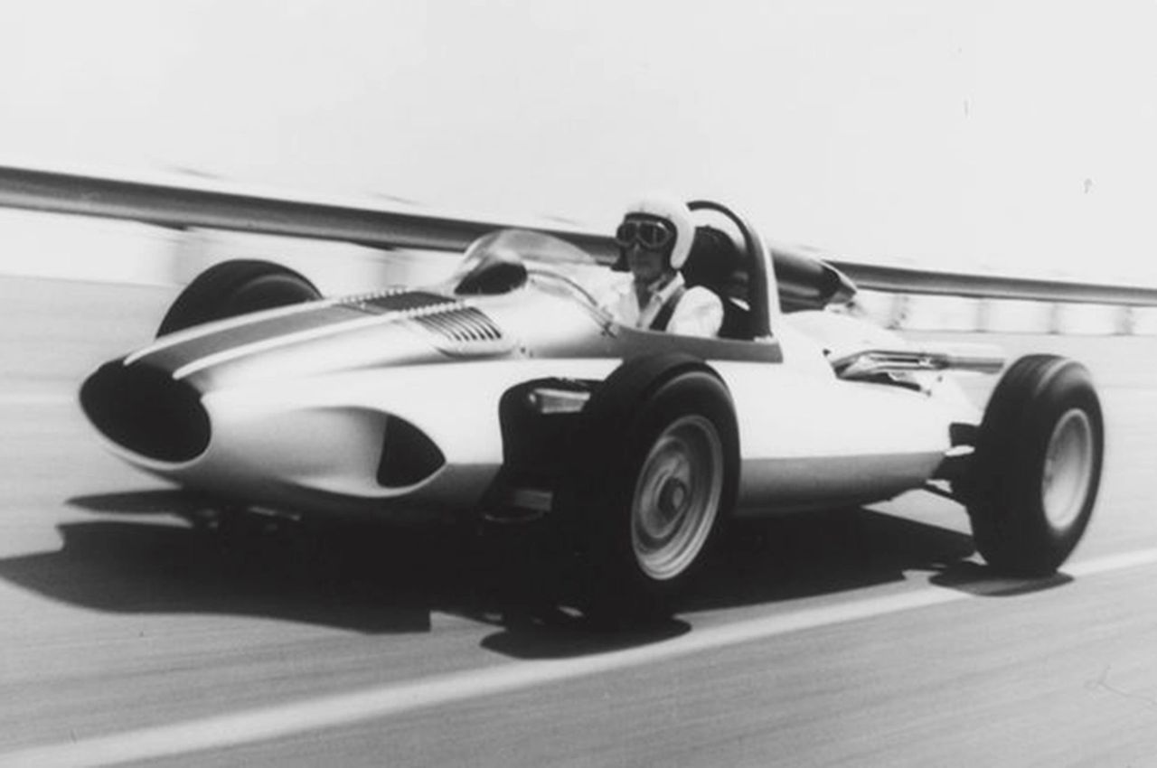 Flat-out on GM’s five-mile banked circle at Milford, CERV I stretched its legs during Zora Arkus-Duntov’s high-speed sessions. With the Hilborn-injected, all-aluminum 377 small-block, dry-sump plumbing, and tall ratios in the Halibrand quick-change, the mule recorded a measured 206 mph—a feat later retellings often round to 208–209 mph. Shinoda’s lowered nose and tidied bodywork helped keep lift in check while the inboard-brake, low-compliance chassis stayed eerily calm, turning a home-grown testbed into a 200-plus-mph instrument. (Image courtesy of GM Media LLC.)