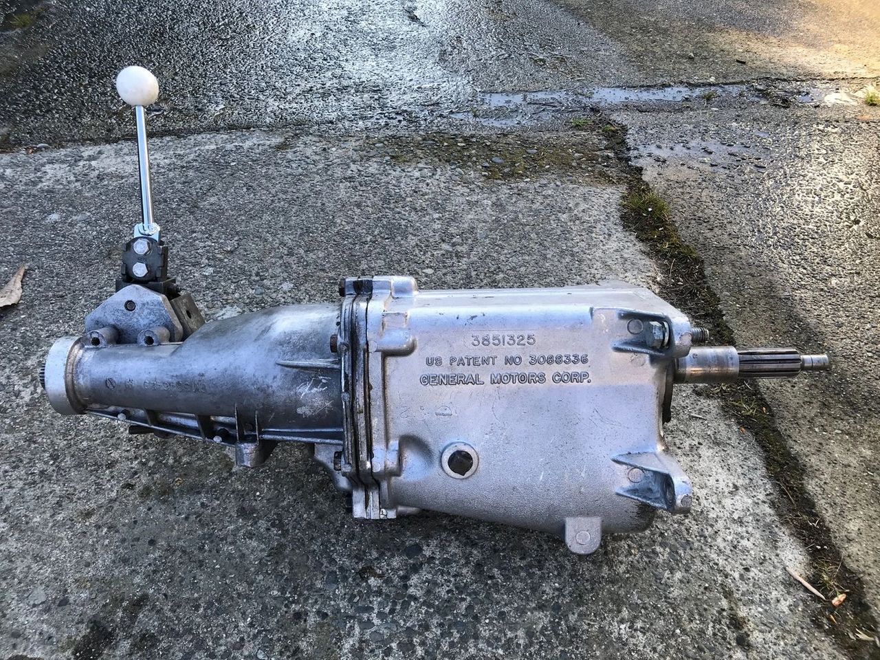 The Muncie M21 was Chevrolet’s close-ratio four-speed—an enthusiast-grade gearbox designed to keep the engine “on the cam” by tightening the spacing between shifts. Compared to the wide-ratio M20, the M21’s 2.20:1 first gear delivered a more performance-focused feel, rewarding drivers who paired it with a deeper rear axle ratio and weren’t afraid to use rpm to stay in the powerband. In Corvette applications, the M21 was typically reserved for higher-output combinations, reflecting its intent as the sharper, more aggressive manual option for buyers who wanted a crisp, mechanical shift quality and stronger acceleration feel once the car was moving. In short: if the TH400 was the smooth torque-handling workhorse, the M21 was the driver’s gearbox—purpose-built for control, response, and speed between the gears.