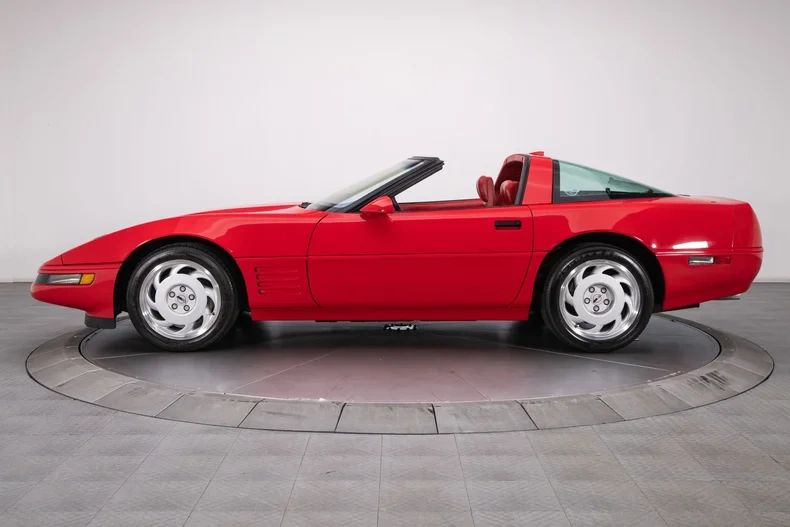 For the 1991 design refresh, Chevrolet introduced a more rounded, sculpted front fascia with larger, wraparound cornering lights/turn signals. The nose gained more aerodynamic contours, softening the earlier wedge look. The rub strip was integrated more smoothly and color-keyed, giving the car a cleaner appearance. The side vents were redesigned into more aggressive, wraparound “sawblade”-style openings that looked deeper and more three-dimensional. The rear gained a smoother, more rounded bumper cover, with the license plate pocket reshaped and the taillights slightly more flush. The overall look was more integrated and less slab-sided. In essence, the updated styling gave the car a fresher, less dated appearance indicative of 1990s automotive styling.