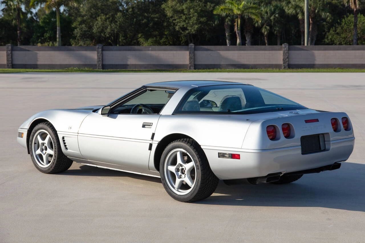 1996 Collector Edition in Sebring Silver Metallic—five-spoke ZR-1-style wheels, subtle CE badging, black calipers, and all the late-C4 polish. A dignified send-off that still looks sharp from any angle.