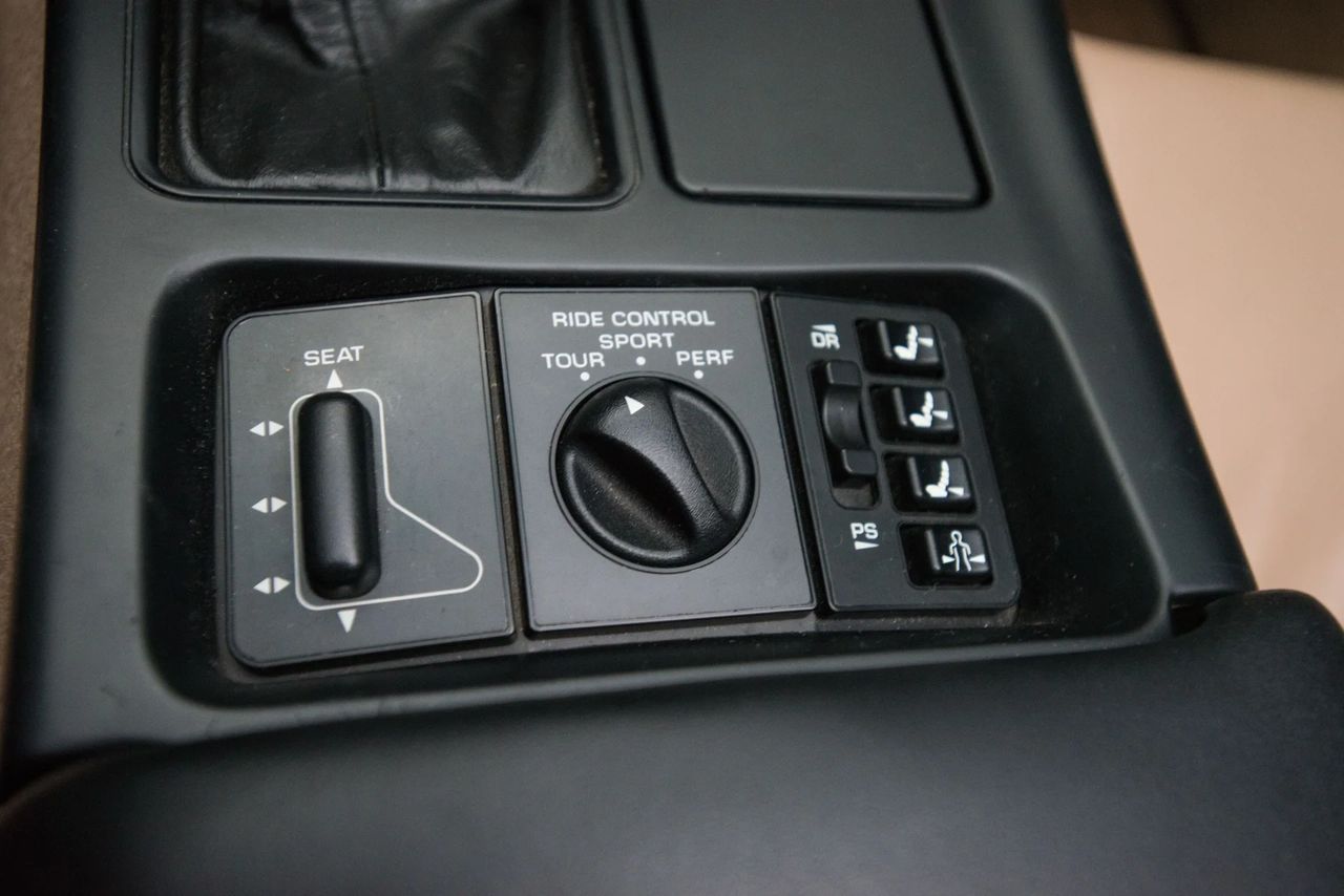 FX3 Electronic Selective Ride Control pairs Bilstein electronically controlled dampers with a console dial—Tour, Sport, Perf—so the C4’s ride can match the road in seconds. Pick a mode and the system trims damping in real time via shock-mounted actuators, sharpening body control under speed, steering, and brake inputs without beating you up on rough pavement. It’s the late-C4 sweet spot: comfort when cruising, discipline when driven. (Image courtesy of RK Motors)
