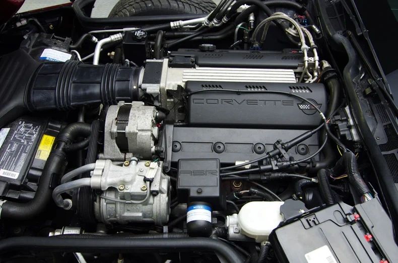 Under the hood of the 1993 Corvette beats Chevrolet’s proven 5.7-liter LT1 V8, delivering 300 horsepower and 340 lb-ft of torque. This second-generation small-block featured advanced technology for its time, including a reverse-flow cooling system that allowed higher compression and improved efficiency while keeping operating temperatures in check. Mated to either a four-speed automatic or a ZF-sourced six-speed manual transmission, the LT1 provided the C4 with exhilarating acceleration and a broad, usable powerband. Combined with electronic fuel injection and modern engine management, it gave the 1993 Corvette a balance of performance, drivability, and reliability that cemented its reputation as a world-class sports car.