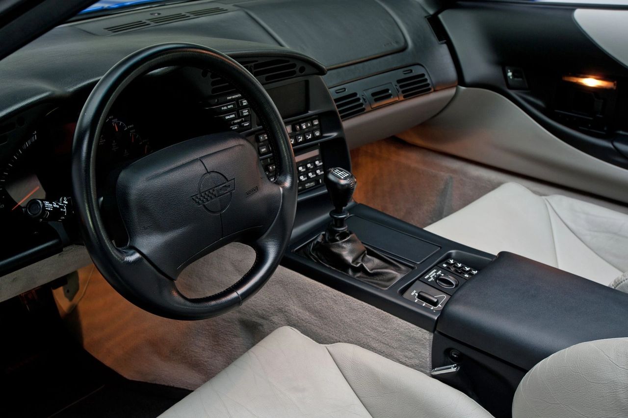 For 1994, the C4 adopted an updated two-spoke airbag wheel that integrated the horn into the airbag pad (earlier 1990–93 cars used separate horn buttons) and used a revised, flush-mount design with a new 1994–96 airbag module. (Image courtesy of RK Motors)