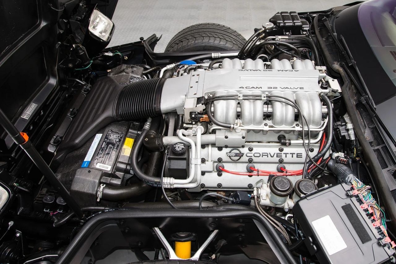 Beneath the hood of the 1991 Corvette ZR-1 lies its crown jewel: the 5.7L LT5 V8, co-developed with Lotus and hand-assembled by Mercury Marine. With dual overhead cams, 32 valves, and 375 horsepower, this exotic all-aluminum engine set the ZR-1 apart from every other Corvette of its era—earning it the title “King of the Hill.” (Image courtesy of RK Motors)