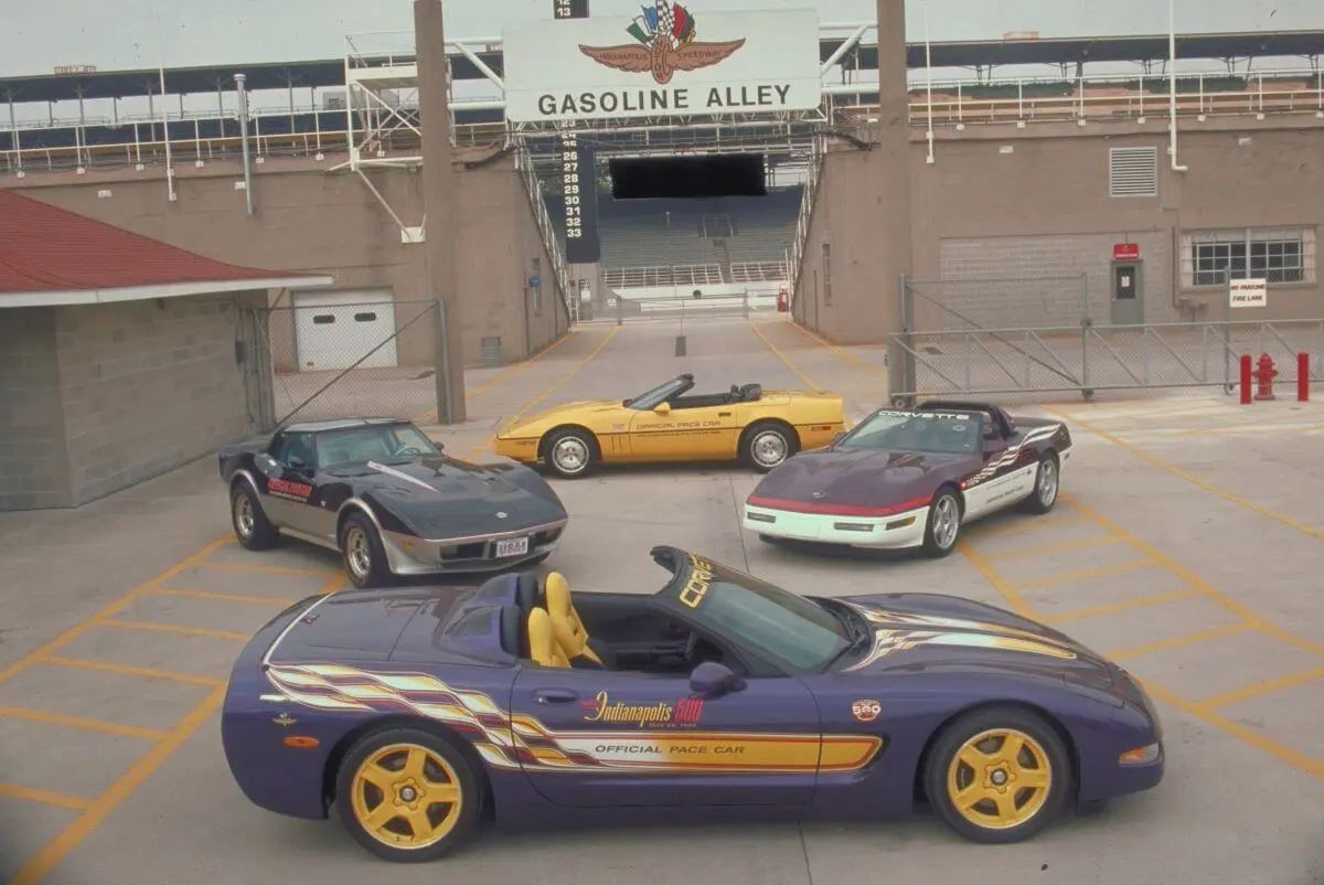 Gasoline Alley roll call: 1978, 1986, 1995, and 1998—the four Corvette Indy 500 pace cars lined up where the show begins. Black-and-silver C3, Sunflower-yellow ’86 ragtop, the purple-over-white ’95 Z4Z, and out front the Radar Blue ’98 with yellow graphics and wheels. Twenty years after Corvette’s first turn at the job, the C5 takes the baton and makes the case in plain sight: same lineage, sharper tools, still leading the field. Indy and Corvette, shoulder to shoulder.