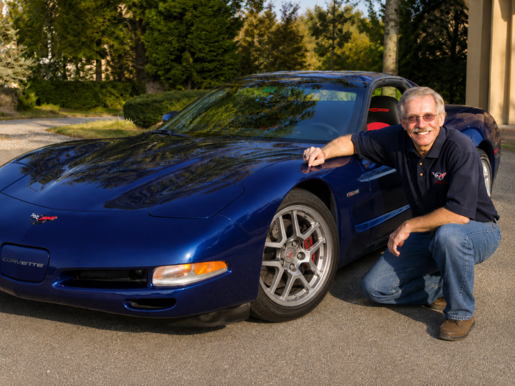 Corvette Chief Engineer David Hill next to the 2001 C5 Corvette Z06.