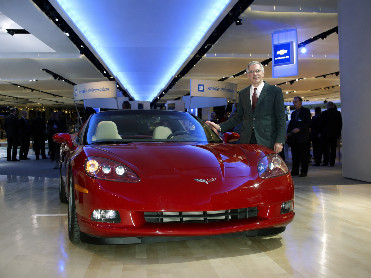 David Hill stands next to a 2005 Corvette Coupe.