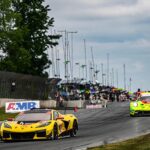 Road America’s new six-hour IMSA enduro delivered everything its expanded format promised: speed, strategy, attrition, and late-race chaos. Through it all, Corvette Racing’s No. 4 Z06 GT3.R survived intact, returned to the GTD PRO podium, and transformed a widening championship deficit into a genuine title fight for the closing rounds.