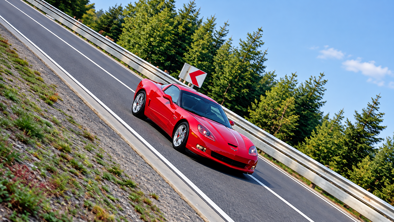 Red Corvette Z06 running time laps at the Nurburgring in Germany.